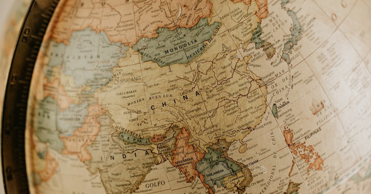 Detailed vintage globe map highlighting Asia, featuring countries like China and India.